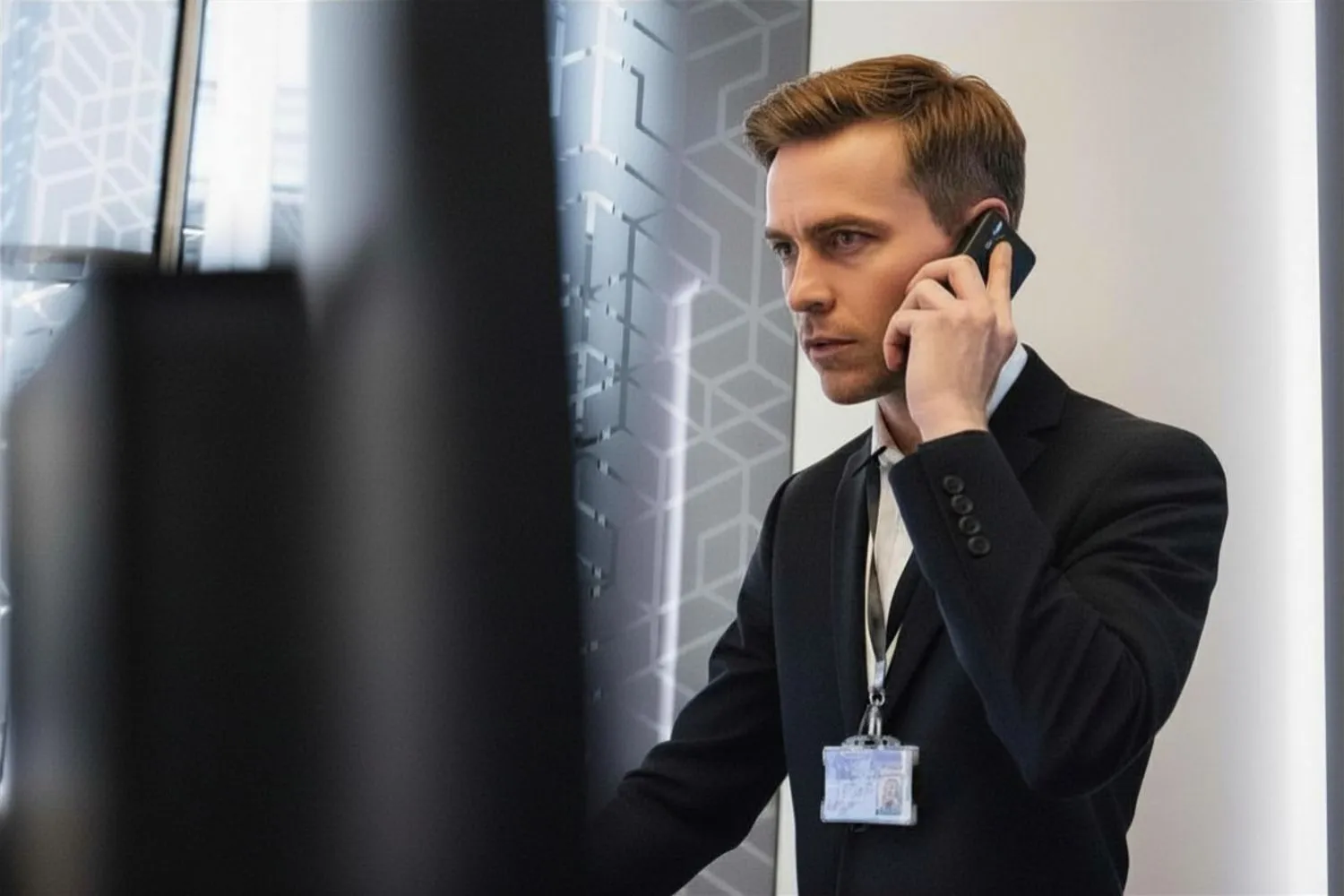 10 person on phone at front desk UK